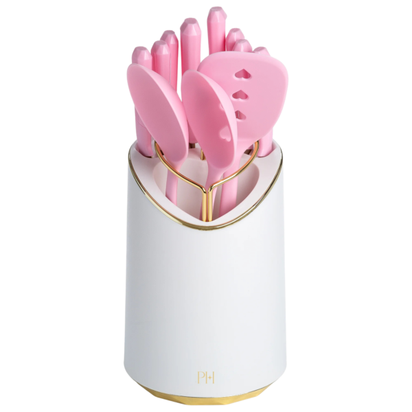 EPIC 12-PIECE KITCHEN UTENSIL SET: Includes everything you need with 4 steak knives, paring knife, utility knife, bread knife, Chef's knife, solid spoon, slotted spoon, slotted turner, and a non-slip rotating caddy. ICONIC DESIGN Features Paris Hilton's signature jewel-shaped handles that add a touch of glam to your kitchen. HIGH-CARBON STAINLESS STEEL: Blades crafted for durability and precision in every cut. NON-SLIP ROTATING CADDY: Keeps your tools organized and accessible, with a stylish touch. DISHWASHER SAFE UTENSILS: Easy cleanup with dishwasher-safe spoons and turner. Knives should be hand washed to maintain their iconic look. #BeAnIcon: Share your iconic bakes with #BeAnIcon for a chance to be featured on Paris Hilton’s social media!"