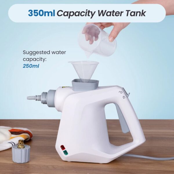 Handheld Steam Cleaner cleaning kitchen tiles